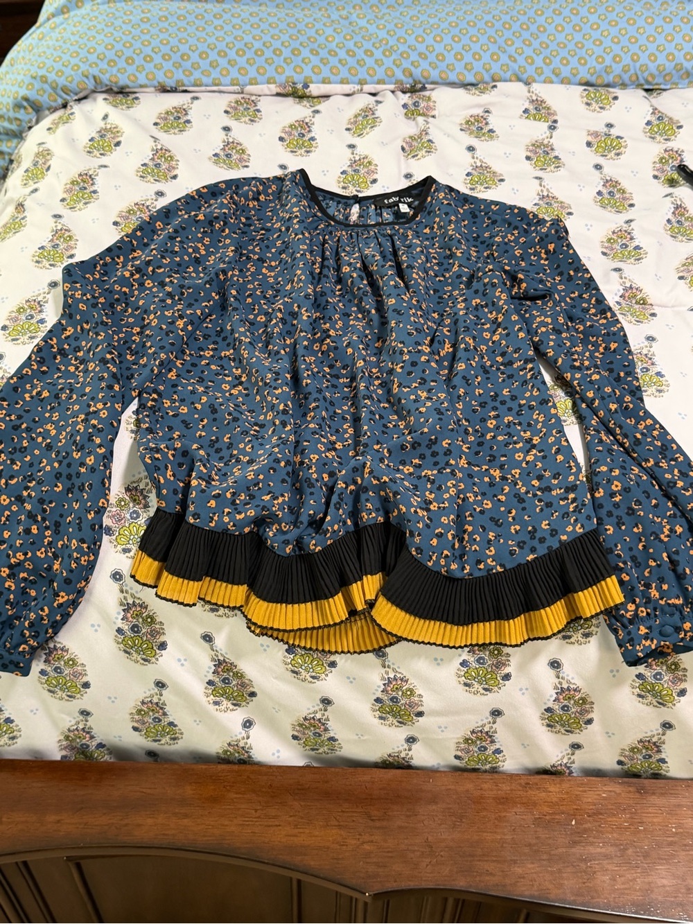 fab'rik Blue Floral Print Long-Sleeve Blouse with Black and Yellow Pleated Hem